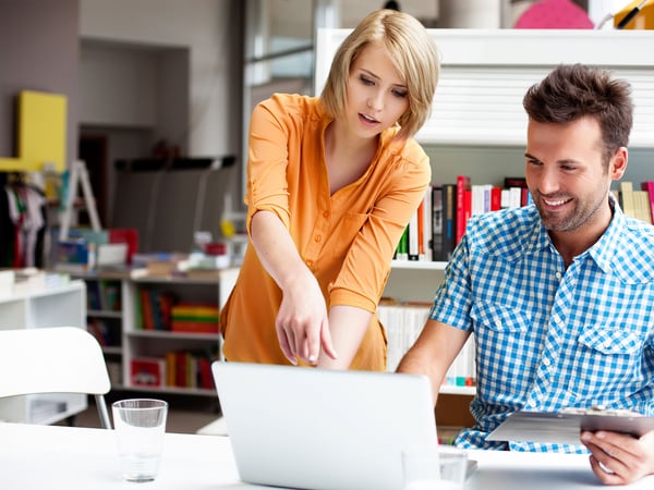 business_partners_looking_at_computer