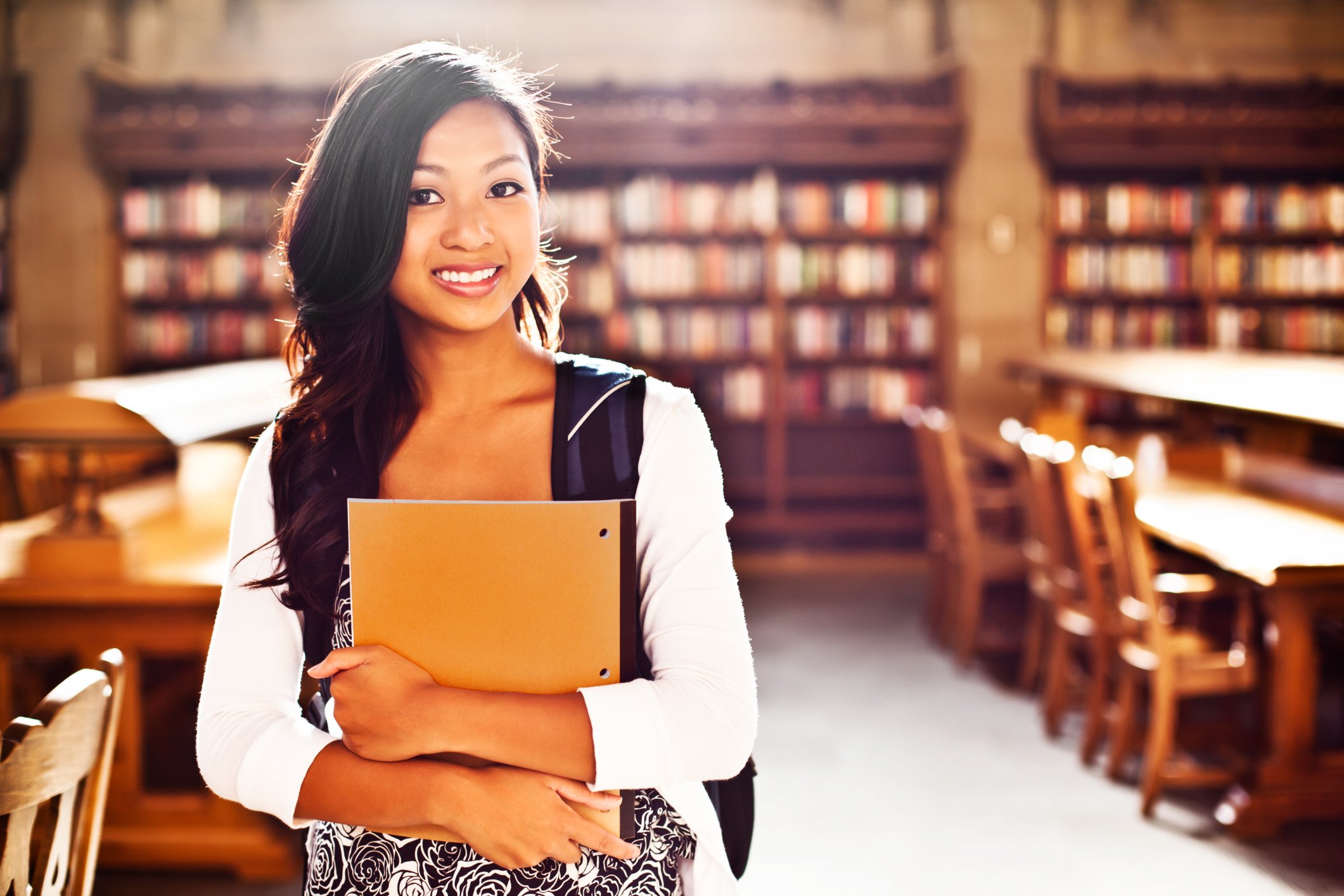 college_student_with_orange_notebook